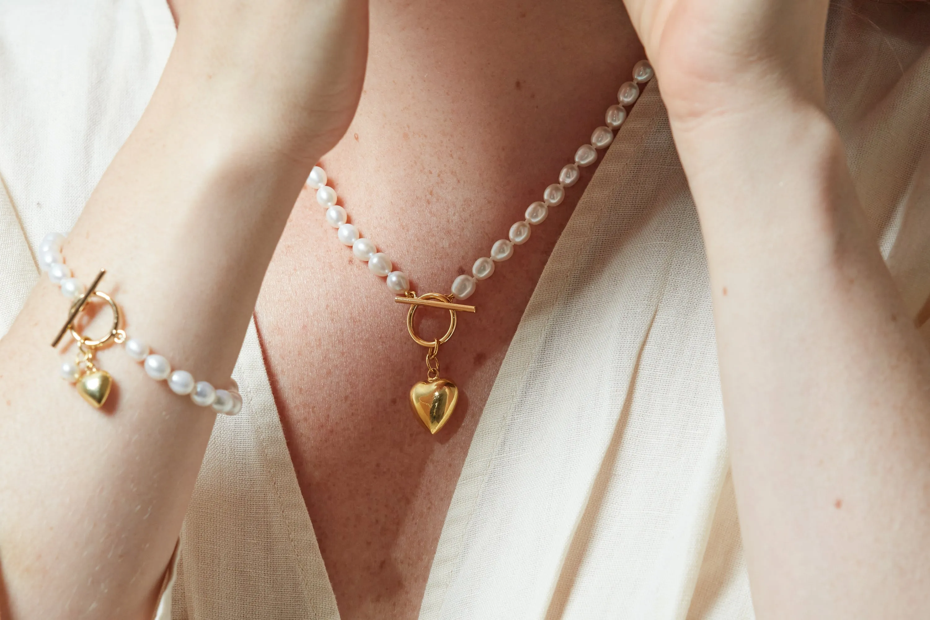 Amare oval cultured freshwater pearl necklace with gold vermeil heart