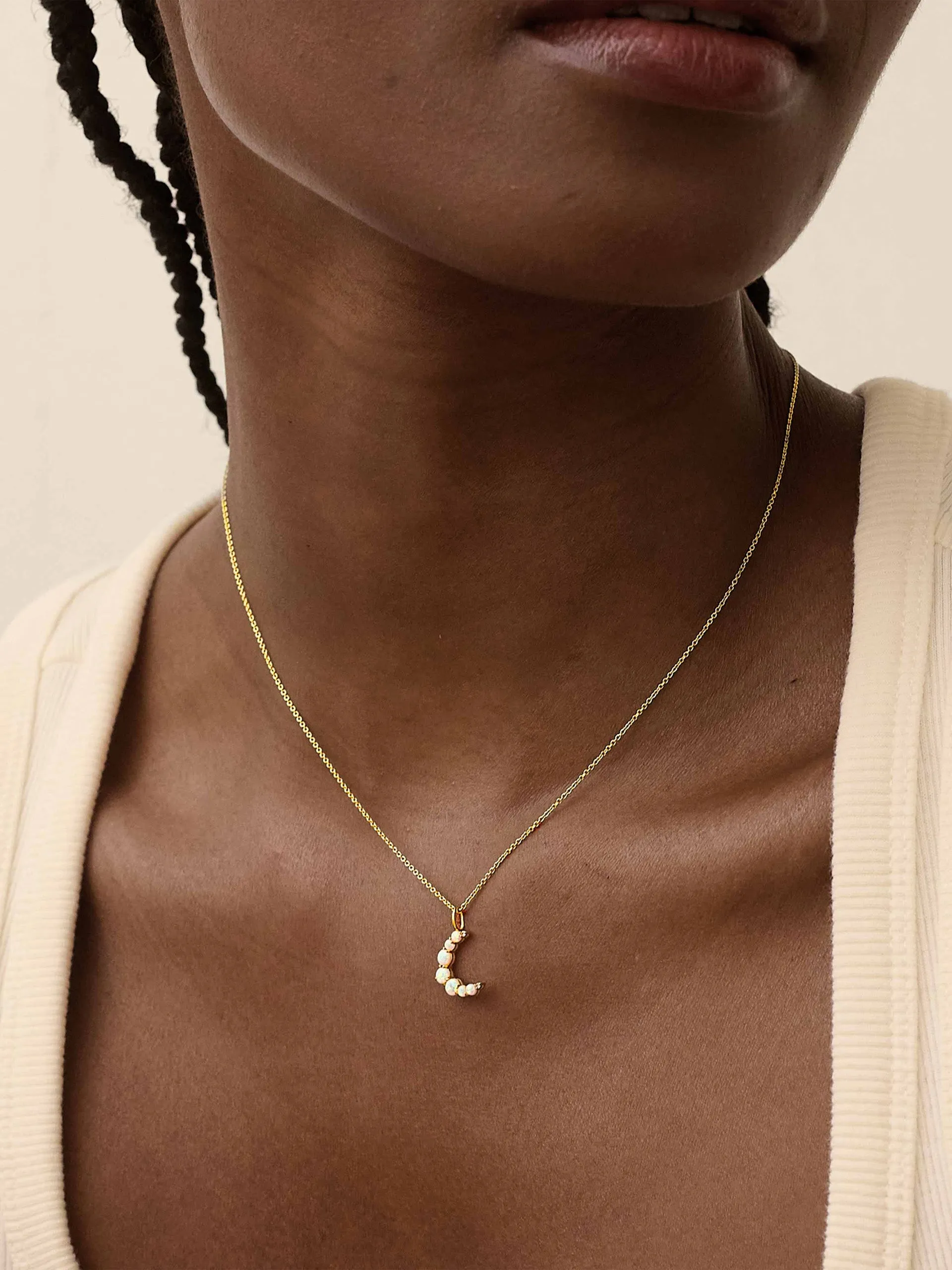 Crescent opal pendant