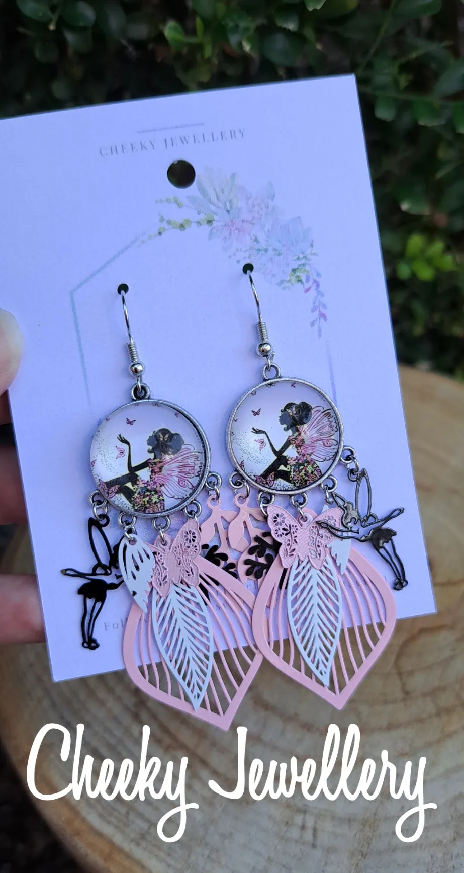 Flower fairy earrings. 
Light weight dangly earrings. so cute. Filigree earrings, dangly earrings.