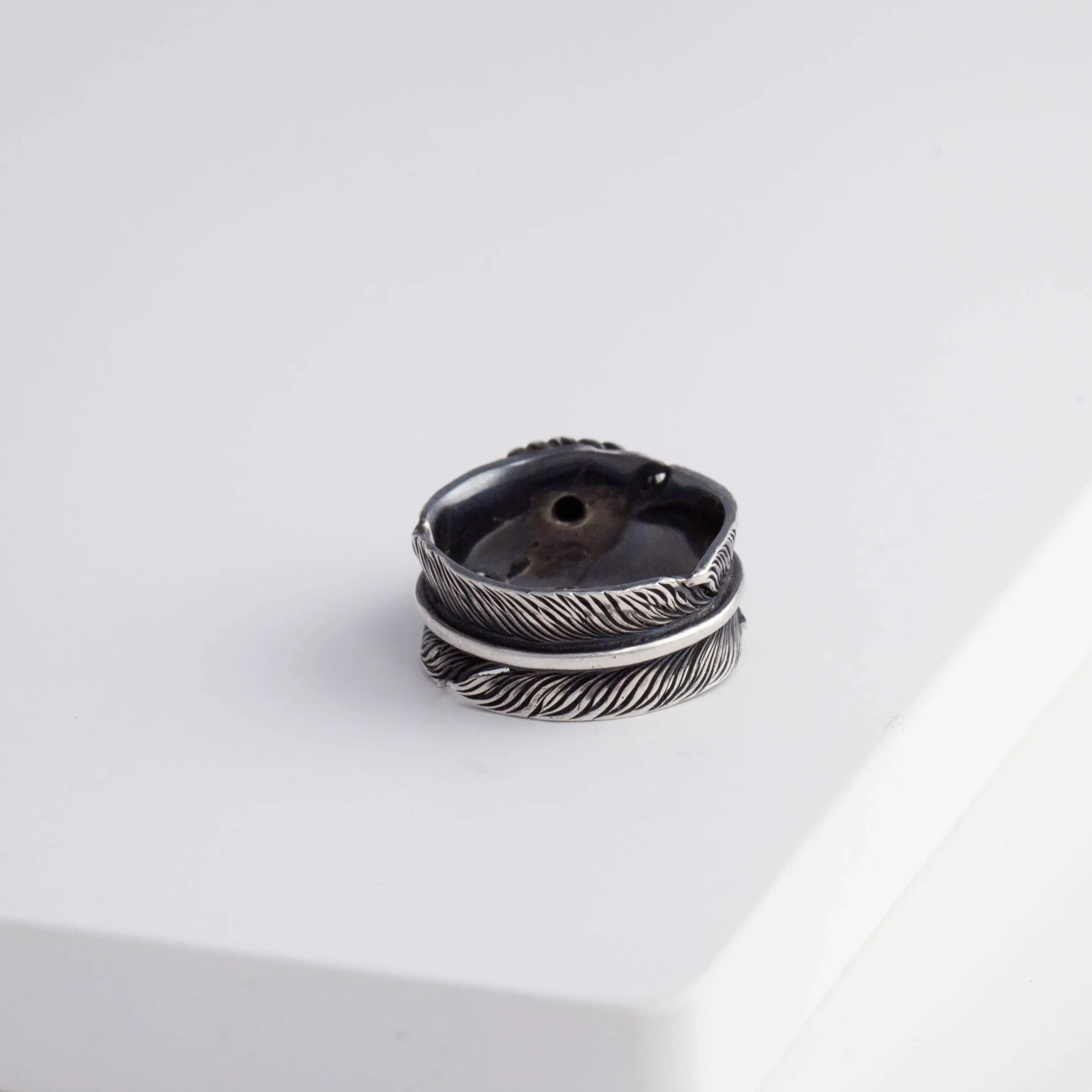 Oxidized silver large infinity feather ring with Kyocera opal