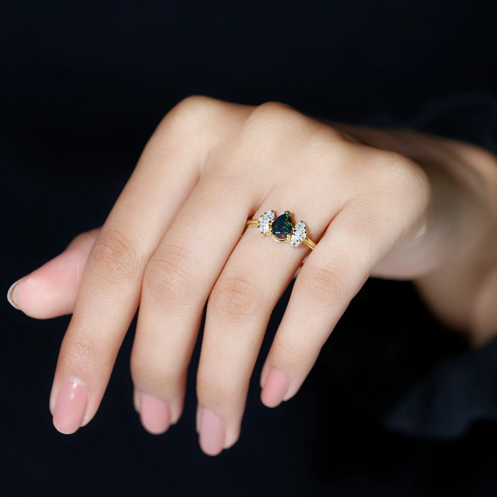 Pear Cut Black Opal Solitaire Engagement Ring with Diamond Trio